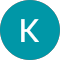 Turquoise circle with white uppercase letter K centered